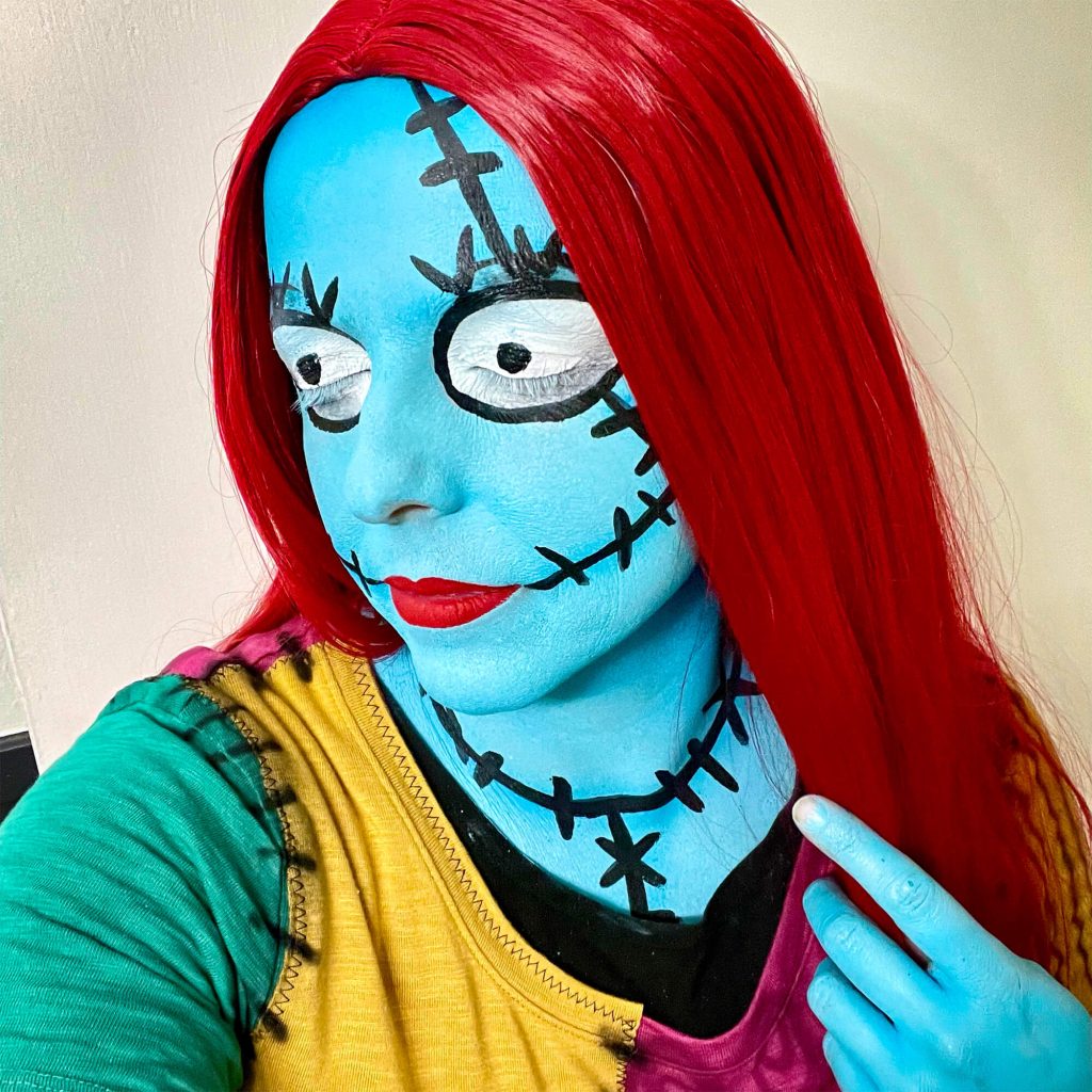 Closeup of costume with body paint of Sally from Nightmare Before Christmas